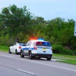 traffic cop pulling over a car