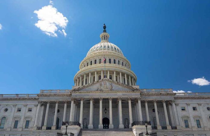 U.S. Capitol building against a clear blue sky.