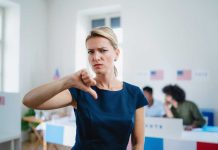 Woman with thumbs down