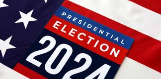 Presidential Election 2024 sign on American flag.