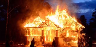 House engulfed in flames