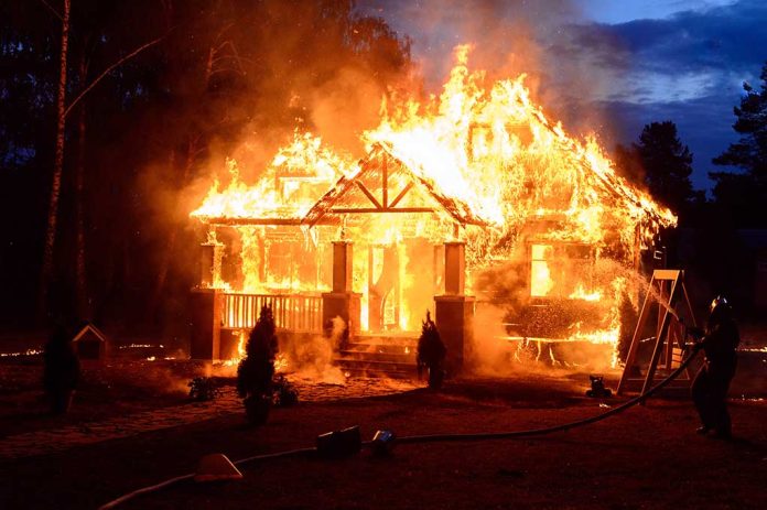 House engulfed in flames