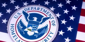 Department of Homeland Security emblem on American flag