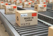 Boxes labeled made in China on conveyor belts.