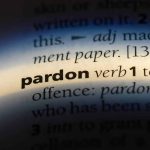 The word "pardon" highlighted in a dictionary.