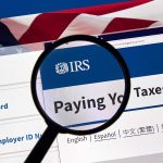 Magnifying glass over IRS website