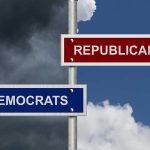 Two directional signs: Republicans and Democrats.