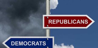 Two directional signs: Republicans and Democrats.