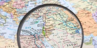 Magnifying glass over the Middle East and Egypt.