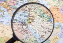 Magnifying glass over the Middle East and Egypt.