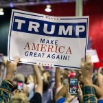 Sign at crowded rally for Trump campaign