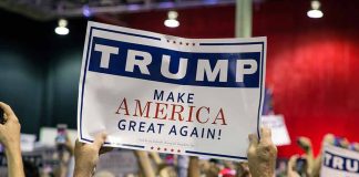 Sign at crowded rally for Trump campaign