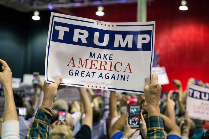 Sign at crowded rally for Trump campaign