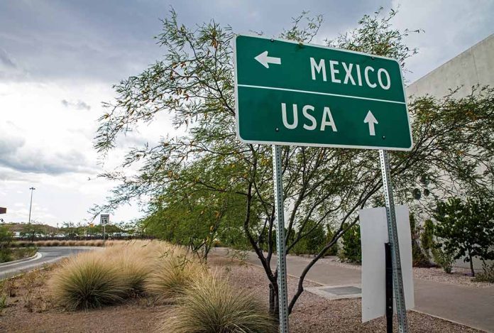 Directional sign for Mexico and USA.