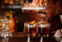 Bartender pouring cocktails