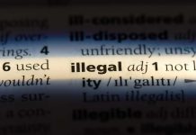 Highlighted word illegal with definition in dictionary.