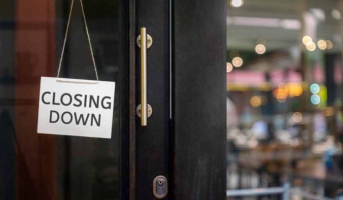 closing down sign on a shop door.