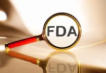 FDA under magnifying glass gold background