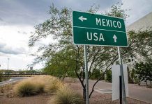 Directional sign for Mexico and USA