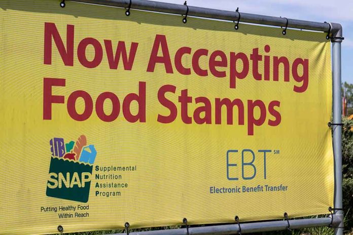 Yellow sign now accepting food stamps EBT SNAP