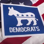 Democrats logo on American flag background