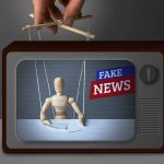 Puppet manipulated inside TV with fake news banner