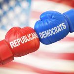 Red Republican and blue Democrat boxing gloves together