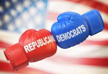 Red Republican and blue Democrat boxing gloves together