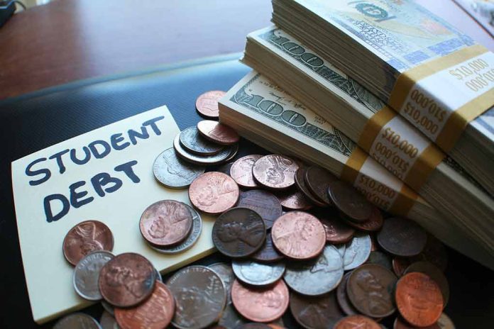 Note with student debt, coins, and banknotes